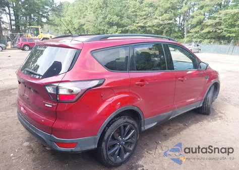 2017 Ford Escape Titanium z USA, uszkodzony, nr VIN 1FMCU0JD2HUD91350